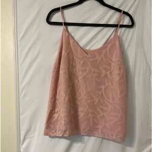 Lightweight, champagne to light pink colored top
